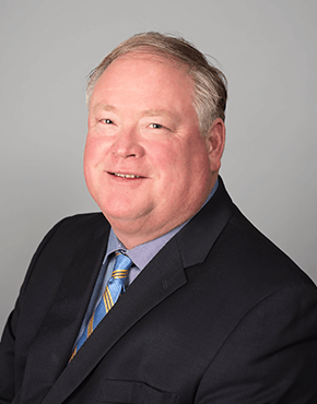 Headshot photograph of Jon Bakkes.